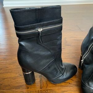BCBGirls size 8 black heeled boots with zipper details